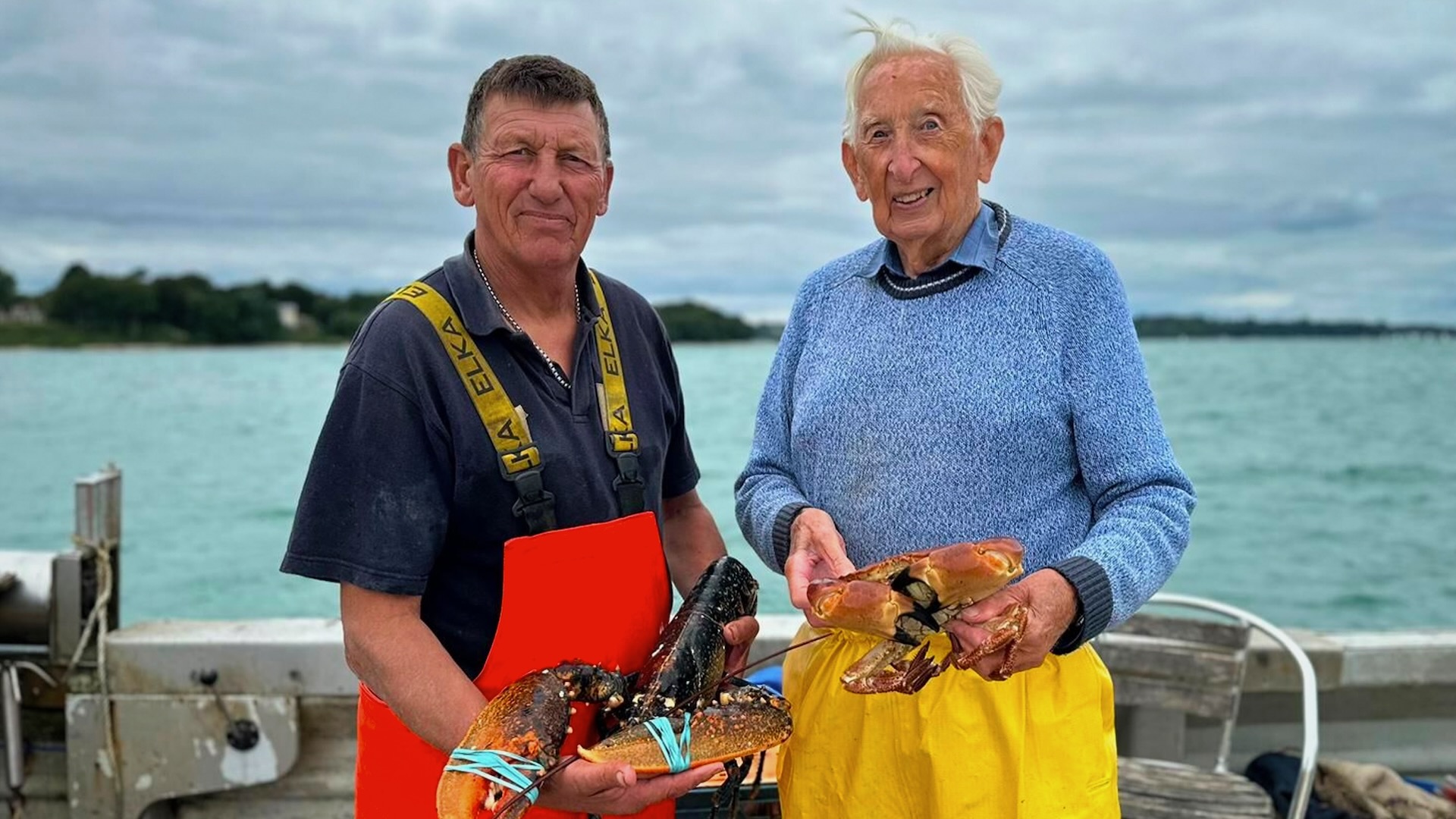Fisherman pose with lobsters and crab for Channel 5's Isle Of Wight programme